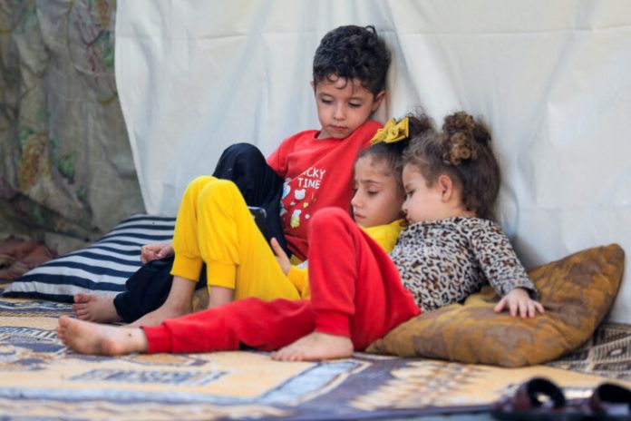 Displaced Palestinians shelter at Shifa hospital in Gaza City